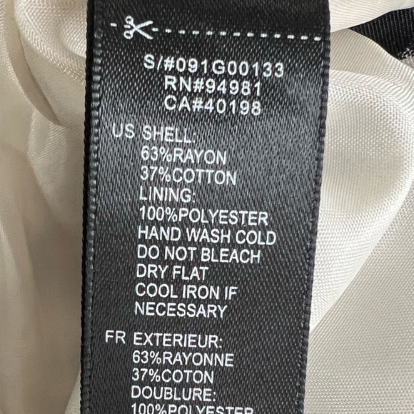 Forever 21 black polka dot mini skirt. Bow accent. Size zip. Size small. - Picture 3 of 5